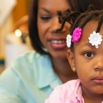 Close up of cute little girl in preschool